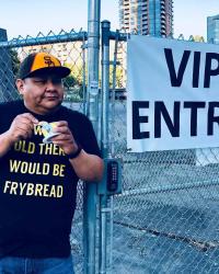 Joe Seymour leaning on fence