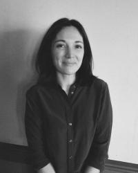 black and white headshot of a woman