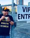 Joe Seymour leaning on fence