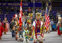 Grand Entry at 53rd Annual UW First Nations Powwow. Comanche Mike. rows of dancers in traditional regalia at UW Hec Edmundson Pavilion