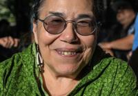 Dian Million wearing glasses, smiling at the camera